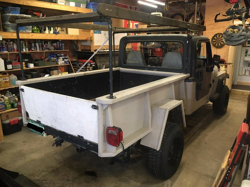 Illustration for article titled At $9,000, Could This 1994 Jeep Wrangler Diesel Pickup Have You Saying ‘Take My Money?’
